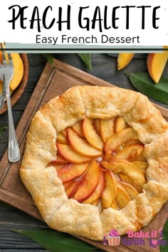 this peach galette is made with fresh peaches and served on a wooden cutting board