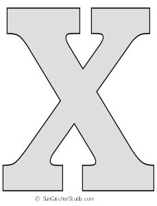 the letter x is cut out from paper and ready to be used as a craft project