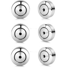 four different types of metal knobs on a white background, each with a black hole in the middle