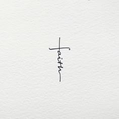 the word faith written in cursive ink on white paper