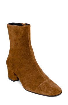 A square toe and wrapped block heel balance a luxe bootie that will complement your poised wardrobe. Leather upper, lining and sole Made in Portugal Kat Jamieson, Fall Booties, Tan Booties, Short Heels, Suede Boots, Who What Wear, Wedge Boot, Bootie, Chelsea Boots