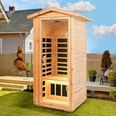 a small wooden sauna in the yard