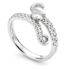 Our Kraken ring designs are truly unique and sure to captivate anyone looking for an ocean-inspired engagement ring. We had a request to design an octopus-inspired engagement ring for a local client, and we've since made variations for other clients. Please see the above images for inspiration.  The team will work closely with you, discussing your requirements before providing a quote based on your choices. We create detailed CAD images for you to make amendments or alterations before work begin Octopus Engagement Ring, Octopus Wedding, Octopus Ring, Bee Wedding, Unusual Engagement Rings, Baguette Engagement Ring, The Kraken, Diy Jewelry Projects, The Octopus