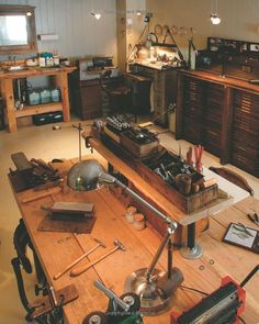 a workbench with many tools on top of it