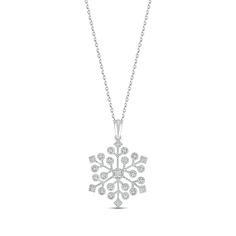 Shimmering with wintry wonder, this intricate snowflake necklace is crafted in cool sterling silver. A flurry of glistening diamond accents adorn the design. The pendant sways from an 18-inch cable chain that secures with a lobster clasp. Silver Snowflake Necklace For Holiday, Elegant Silver Necklace For Winter, Winter White Sterling Silver Necklaces, Elegant White Holiday Necklaces, Elegant Holiday Snowflake Necklace, Elegant Silver Necklace, Intricate Snowflake, Snowflake Necklace, Accessories Jewelry Necklace