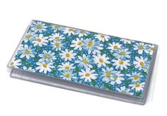 a blue and white flowered business card case on a white background with polka dots