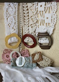 an open book with doily and other items on it