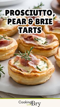 Delight your taste buds with these elegant Prosciutto, Pear, and Brie Tarts. Crispy puff pastry is topped with slices of ripe pear, creamy Brie cheese, and savoury prosciutto, creating a perfect harmony of flavours. These tarts are easy to make and ideal for appetisers, brunch, or a light lunch. Impress your guests with this sophisticated yet simple dish, and serve with a drizzle of honey and fresh thyme for an added touch of gourmet flair. Puff Pastry Appetizers With Brie, Brie And Prosciutto Puff Pastry, Thyme Pear And Brie Tart, Pears And Cheese, Pear And Prosciutto Appetizers, Brie And Pear Puff Pastry, Mini Brie Recipes, Brie And Pear Appetizer, Pear And Brie Puff Pastry Tarts