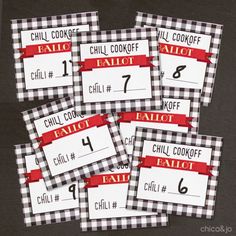 four place cards for chili cook off with the number one on them and red ribbon