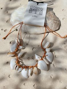 Shop Boho Seashell Choker Necklace | Beach Seashell Necklace | Ocean Treasure | COCO DE CHOM Adjustable Shell Beachy Necklace, Adjustable Shell Necklace With Beachy Style, Adjustable Ocean-inspired Necklace, Handmade Coastal Jewelry For Summer, Summer Shell Necklace For Gifts, Adjustable Strand Shell Necklace For Beach, Adjustable Summer Beach Jewelry, Adjustable Beachy Necklace For Festivals, Adjustable Beachy Necklaces For Beach