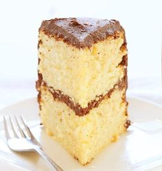 a piece of cake sitting on top of a white plate