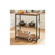 a kitchen island with pots and pans on it