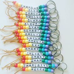 a bunch of keys that are next to each other with words on them in different colors