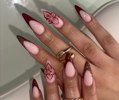 Elevate your nails with this stunning 3D burgundy floral french nail set. With elegant floral designs in trend now, there is no better set to have on! They exude class and style without doing too much. Perfect for an everyday nail set of for special occasions, such as weddings, graduation, birthdays and special holidays.   Each nail set is custom made for each customer. If you have any questions about the size or style of the nails, please message me, I'm more than willing to assist of answer any queries you may have.  We understand that our customers appreciate quick and seamless deliveries so we work around the clock to deliver high quality press on nails in a short period of time. We take 1-4 working days to make the set, followed by 5-12 working days delivery. Each package gets FREE in Red Bow Nails French Tip, Almond Winter Nails Designs, Nails Burgundy Design, Persephone Nails, Burgundy Winter Nails, Poinsettia Nails, French Nail Set, Ongles Goth, Blooming Gel Nails