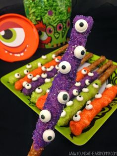 some food sticks with googly eyes on them