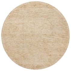 a round rug with an oval design on the top and bottom, in beige tones