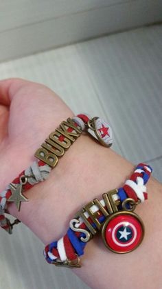 the bracelet is decorated with red, white and blue beads on it's wrist