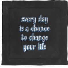 a black towel with the words every day is a chance to change your life