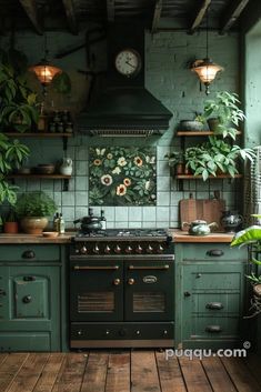 a kitchen with green painted cabinets and an old fashioned stove top oven in the center