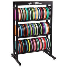 a rack with many different colored discs on it