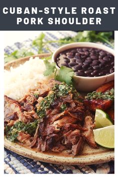 a plate filled with meat, beans and cilantro on top of a table