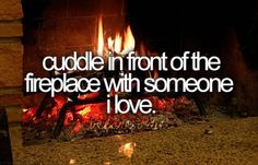 a fire place with some flames in it and the quote cuddle in front of the fireplace with someone i love