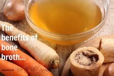 carrots, celery, and other vegetables on a cutting board next to a bowl of oil