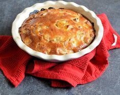 a pie sitting on top of a red cloth