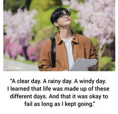 a man with glasses is looking up at the sky while holding a clipboard in his hand