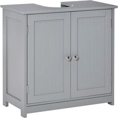 a gray cabinet with two doors and knobs