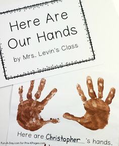 there are two handprints that say here are our hands by mrs levi's class