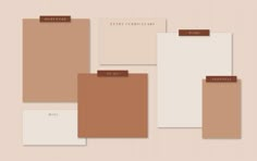 several pieces of paper with brown and white papers attached to each other on a beige background