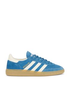 Suede upper with rubber gum sole.  Made in Vietnam.  Lace-up front.  Signature adidas side stripes.  Printed Spezial logo at outer panels.  Padded low-cut collar.  .  .  .  .  .  .  .  .  .  . Adidas Spezial, Crystal White, White Crystal, Side Stripe, Blue Cream, Christmas List, Cream White, Low Cut, Adidas Originals