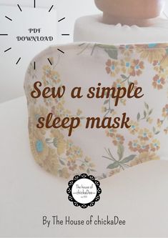 a close up of a face mask on a white surface with the words sew a simple sleep mask