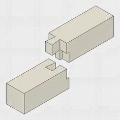 two pieces of white cardboard sitting next to each other