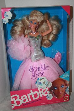 the barbie doll is in its original box