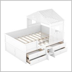 a white bed with drawers underneath it