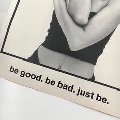 an advertisement with a woman in a bathing suit and the words be good, be bad, just be