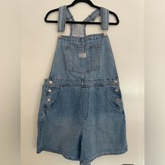 Nwt! Offers And Questions Welcome. Shorts Can Be Rolled Or Left As Is. Levi's Shortalls With Pockets For Summer, Levi's Summer Shortalls With Pockets, Levi's Blue Summer Overalls, Levi's Summer Shortalls, Blue Utility Shortalls For Spring, Levi's Denim Overall Jumpsuit, Levi's Summer Jumpsuits And Rompers With Pockets, Levi's Casual Summer Shortalls, Levi's Cotton Shortalls For Spring