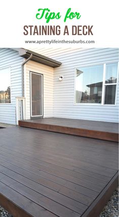 a wooden deck with the words tips for staining a deck on top of it