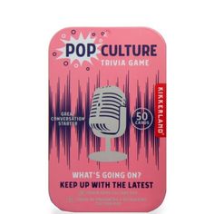 the pop culture trivia game is pink and has a microphone on it, which reads what's going on? keep up with the latest