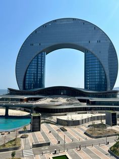 an aerial view of a large building near the ocean