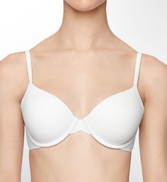 Look sleek under all your fine knits in this contour underwire bra with a silky-smooth nylon/spandex microfiber body. Contour/t-shirt bra with light padding has supportive underwires to lift and round. Flexible, stretch cup is padded and has a silky microfiber overlay. Fused, stretch top cup edge gives a more custom fit. Bandless front is less bulky for petites and women with short torsos. Center panel - arched for high tummies, low for plunge necklines. Seamless, lined sides and back have turne Classic Padded Solid Bra, Classic Padded Solid Color Bra, Calvin Klein Fitted Seamless Bra, Calvin Klein Seamless Fitted Bra, Fitted Seamless Calvin Klein Bra, Classic Seamless Solid Bra, Classic Seamless Solid Color Bra, Classic Seamless Bra, Bra With Removable Pads And Minimal Stretch