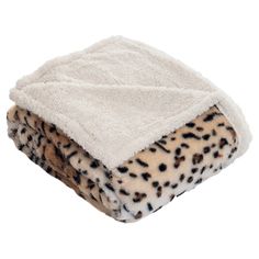 a white and black animal print blanket