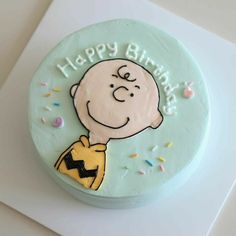 a birthday cake with a cartoon character on it