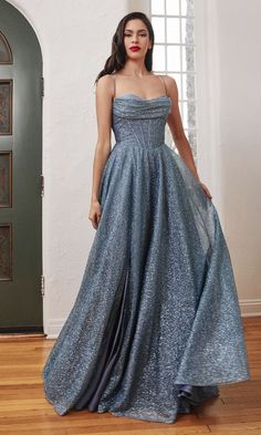 Shimmer and shine in this beautiful long glitter prom dress that combines sparkly details with classic style. With a sweetheart neckline, this elegant evening gown is fully lined with a sheer glitter overlay that shines with every move at prom, galas, and other black-tie events. In misses and plus sizes, this long glitter formal dress has a corset-style bodice that wraps around to the back and a drape detail that adds a vintage vibe. The long skirt flows to the floor in a flattering a-line shape Glittering Dress, Cute Bridesmaid Dresses, Cinderella Divine, Spaghetti Strap Prom Dress, Corset Dress Prom, Prom Ball Gown, Dresses Formal Elegant, Evening Gowns Elegant, A Line Prom Dresses