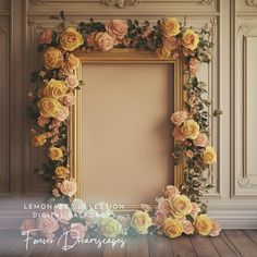 an empty frame with flowers around it in front of a wall