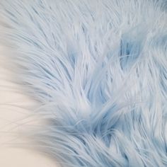 the fur is light blue and fluffy