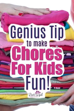 a person holding a pile of clothes with the words genius tip to make chores for kids fun