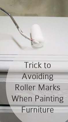 a white dresser with the words trick to avoiding roller marks when painting furniture on it